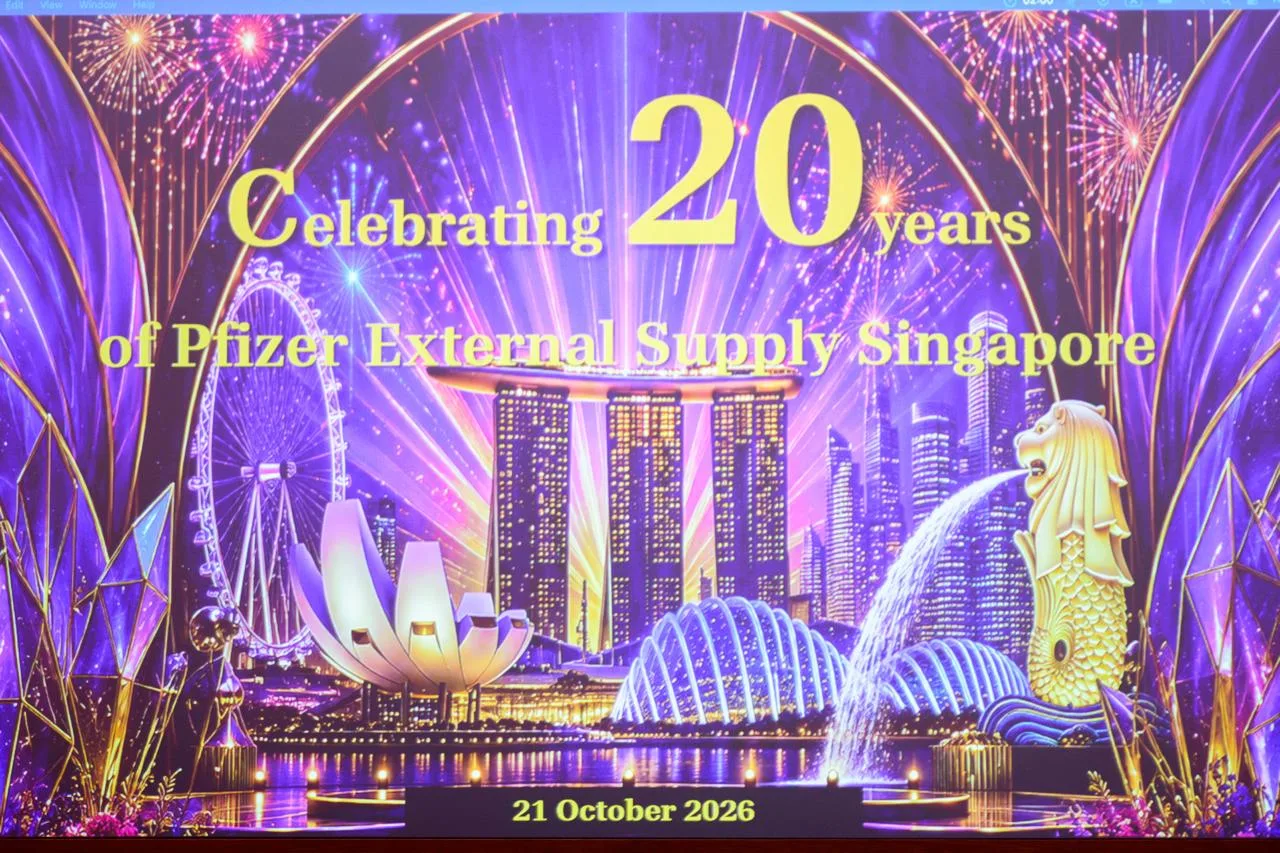 Celebrating 20 years of Pfizer External Supply Singapore corporate key visual on the event screen