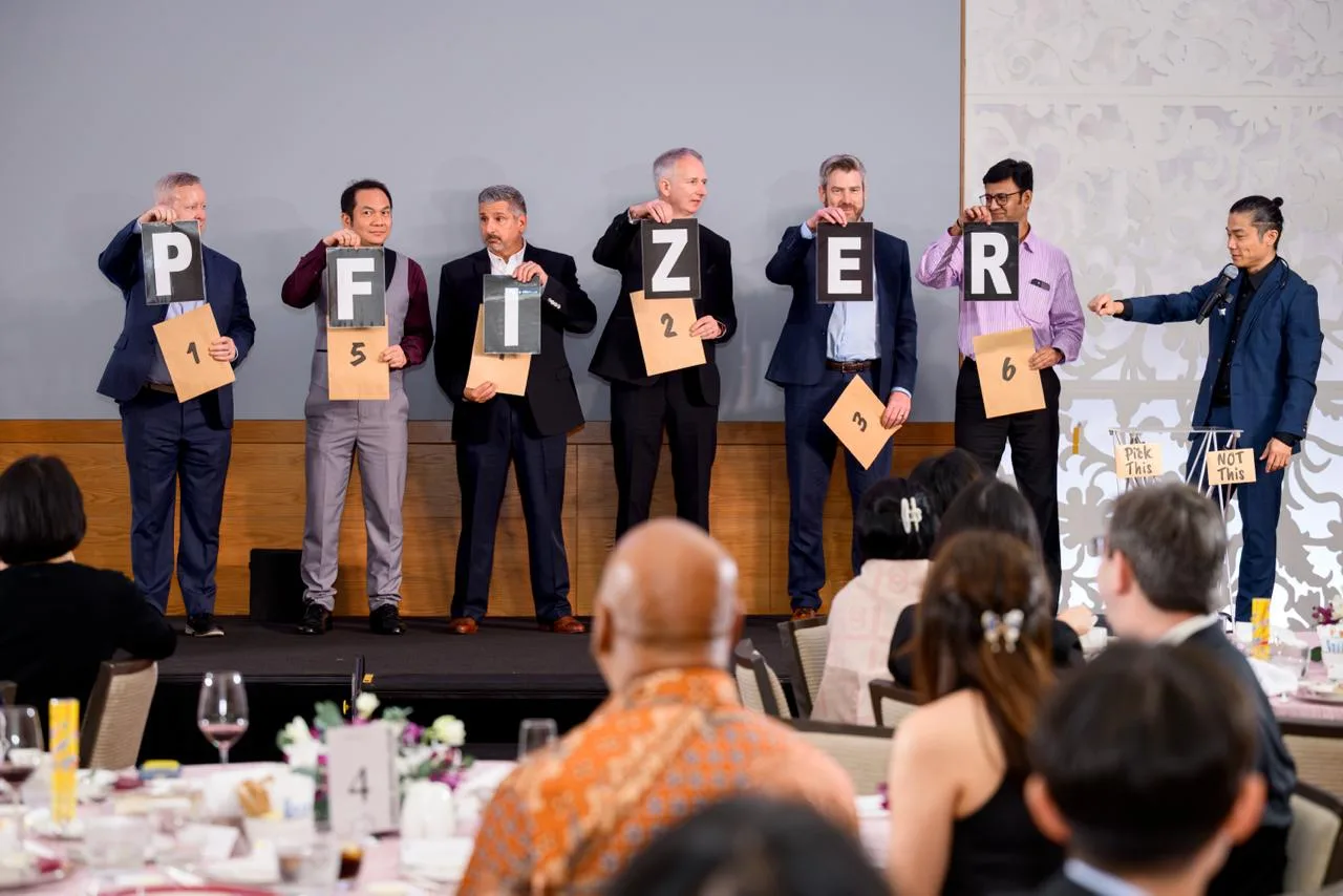 Pfizer leaders on stage during the corporate anniversary programme in Singapore
